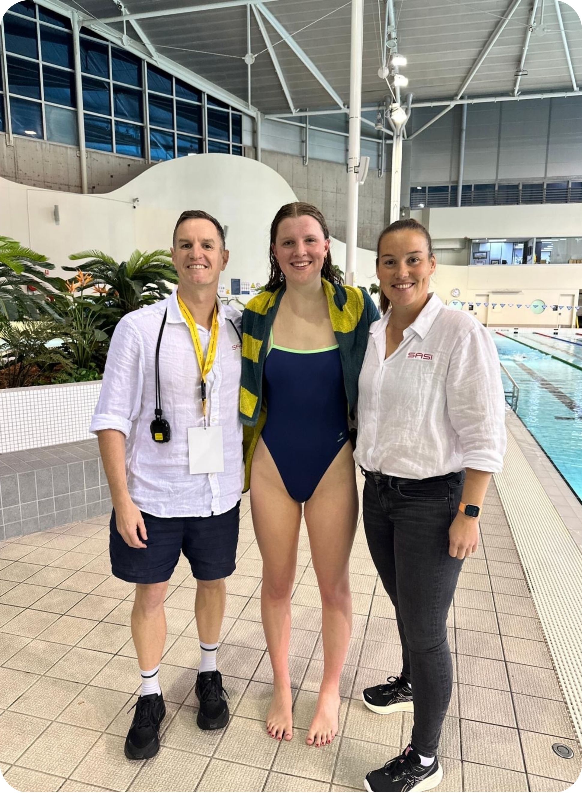 Molly Walker with her coaches