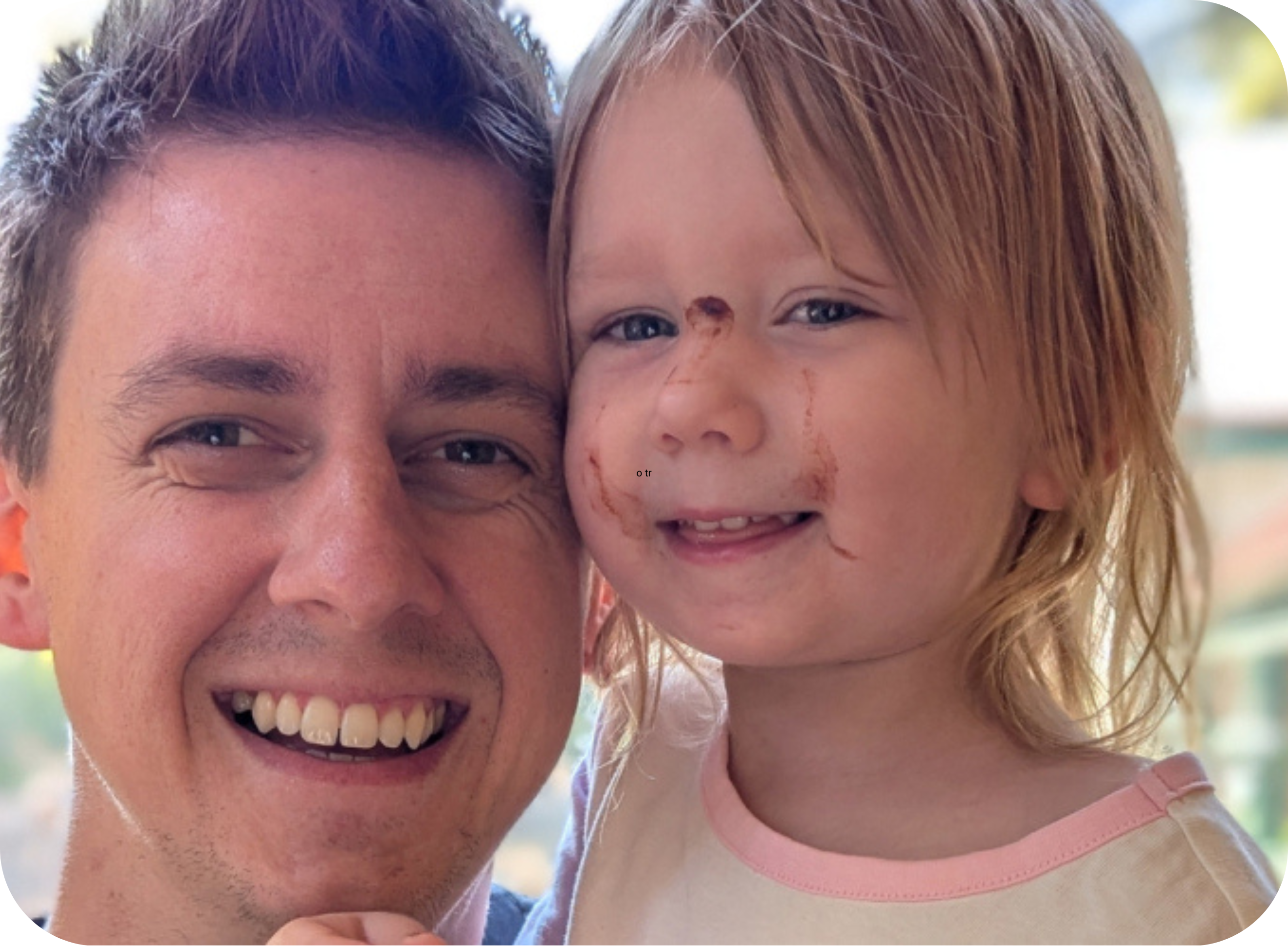 Young father and daughter pictured together smiling