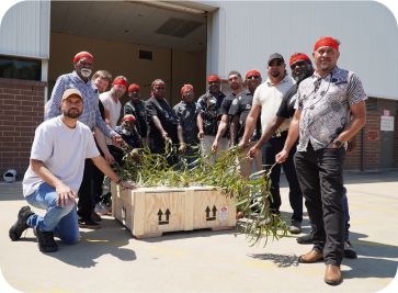 2)Warlpiri men with crate of sacred objects returned from the Nancy Munn collection, USA.