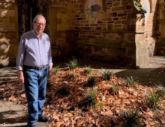 Image of Rev Dr Dean Eland standing in front of Pilgrim Church in Adelaide