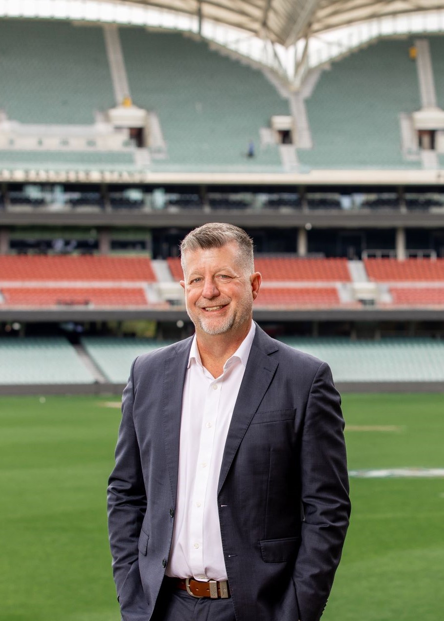 Tim Stollznow, Chief Executive Officer, MyVenue, standing in the middle of Adelaide Oval.