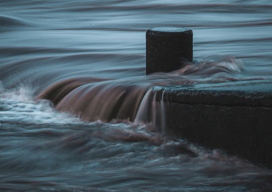 Image of a submarine breaching the surface of the ocean.