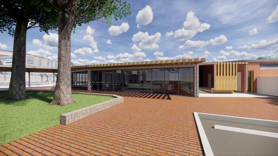 Rendered image of Nuriootpa Primary School upgrade, with a brick pathway leading to a glass-fronted building.