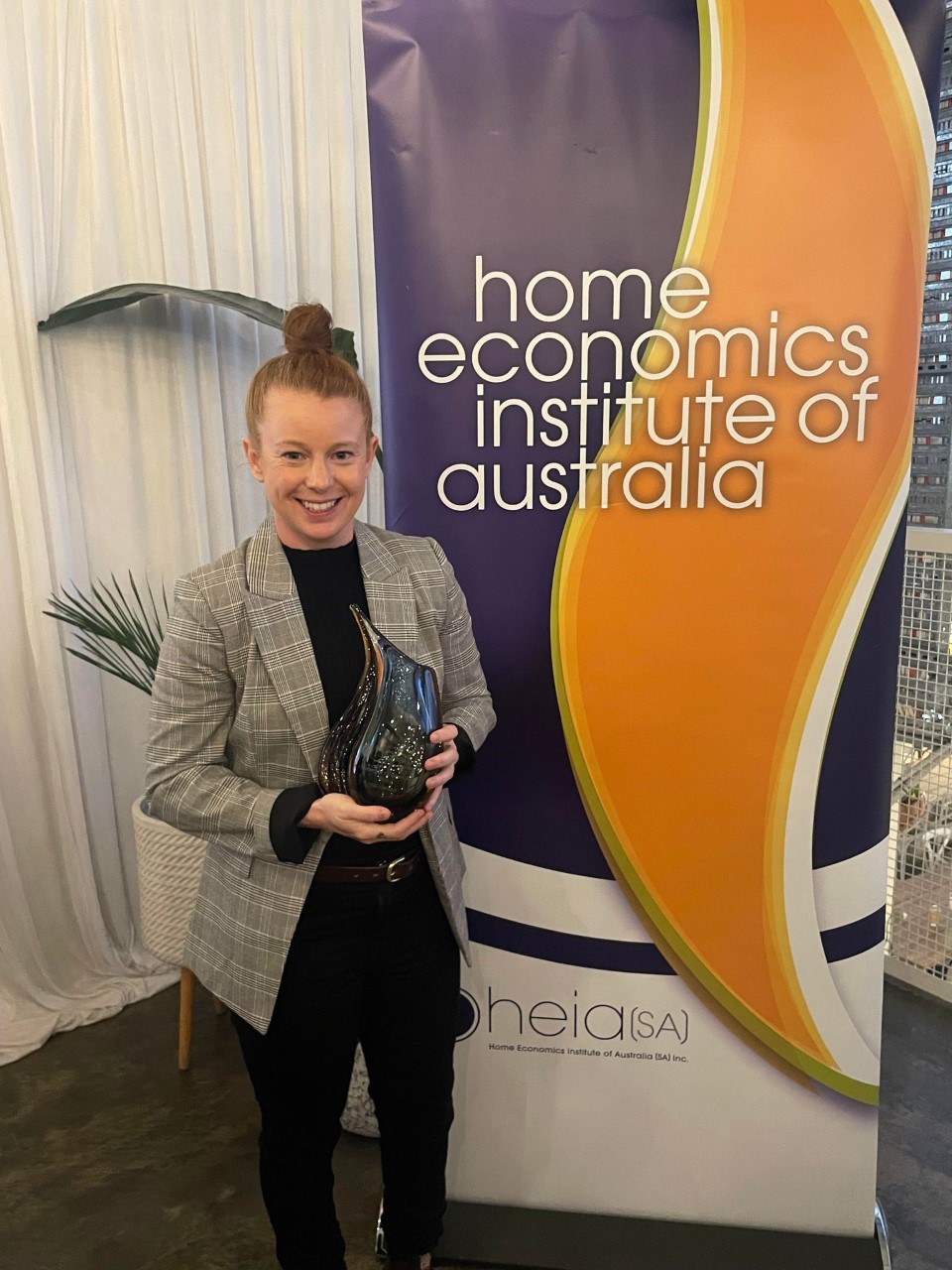 Image of Tash with her Home Economics Institute of Australia award.