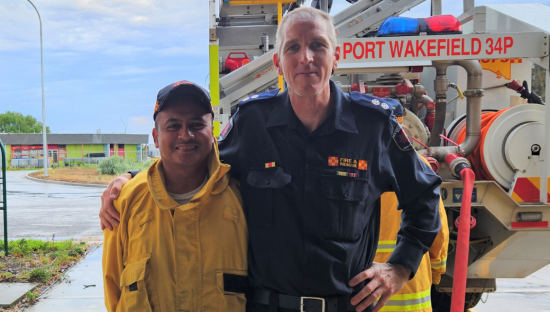 Image of Port Wakefield CFS Captain Warren Miller and  Samson Bucol, a Port Wakefield resident who immigrated to Australia from the Philippines in 2014.