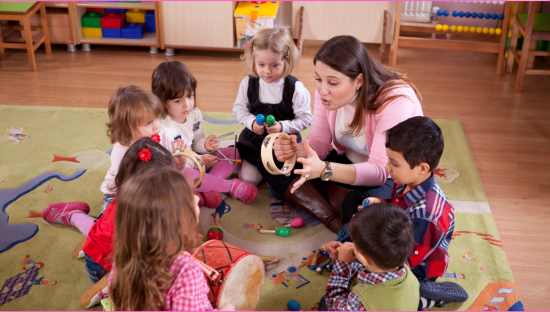 Children play with instruments with educator