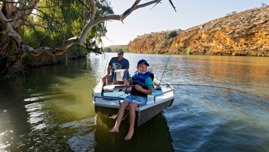 Image of a man and boy fishing on the Murray River, Lakes & Coorong