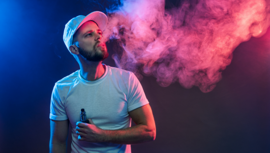 Image of a person smoking a vape
