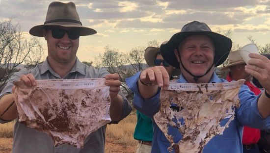 Image of two men holding up undies as part of #soilyourundies