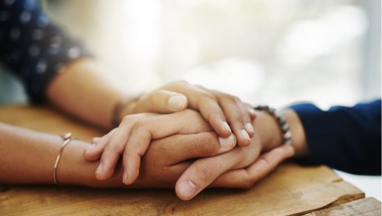 Image of holding hands